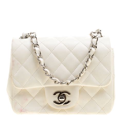 white quilted chanel handbag|chanel magnetic closure handbags.